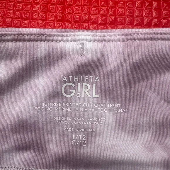 NWT ATHLETA GIRL
HIGH RISE PRINTED CHIT CHAT TIGHT
LEGGING size L 12 - Picture 4 of 7